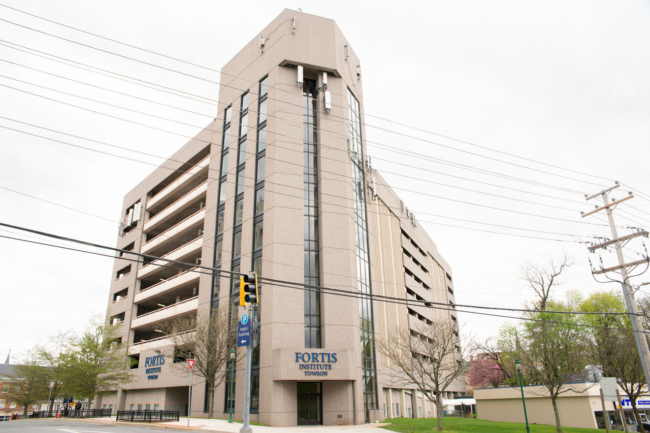 Fortis Institute building exterior on cloudy day