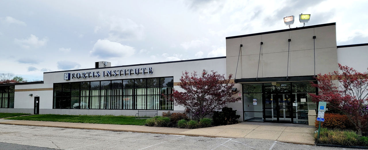 Rogers Institute building exterior on cloudy day