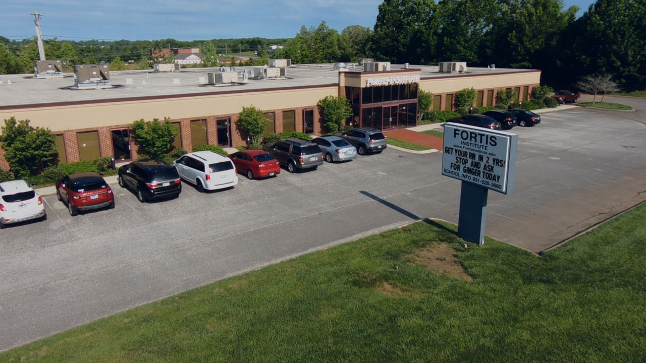 Fortis building exterior with parking lot